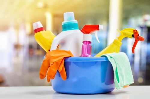 Professional cleaners maintaining a Catford office kitchen and communal area